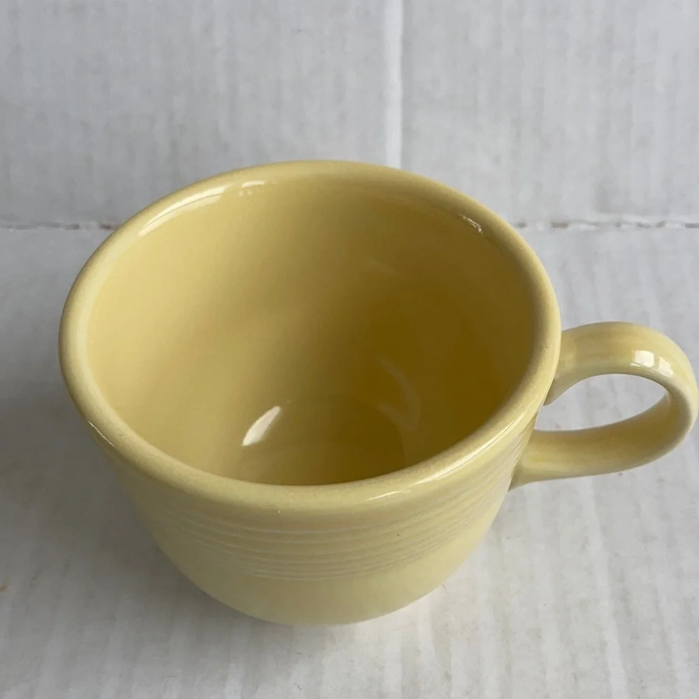 Fiesta yellow tea cup and saucer